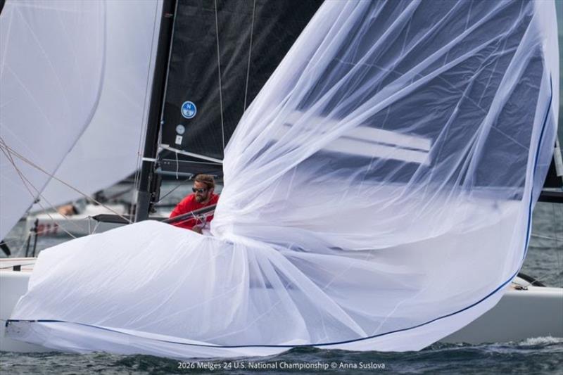 CHOREOGRAPHY IN COLOR: Dick Kalow's Mustang executes the spinnaker douse, as bowman Emory Williams gathers the kite. Its sweeping folds create a moment of artistry amid the intensity of championship racing - photo © Anna Suslova