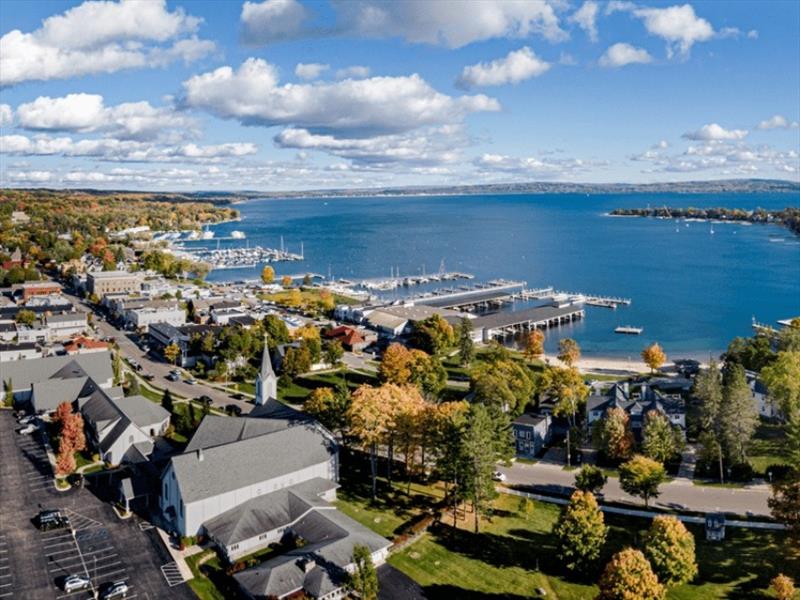 Harbor Springs opens onto Little Traverse Bay, where LTYC, Irish Boat Shop and the waterfront will become the center of Melges 24 activity. By September, the first hints of fall color may frame an already spectacular venue as international fleet gathers - photo © U.S. Melges 24 Class Association