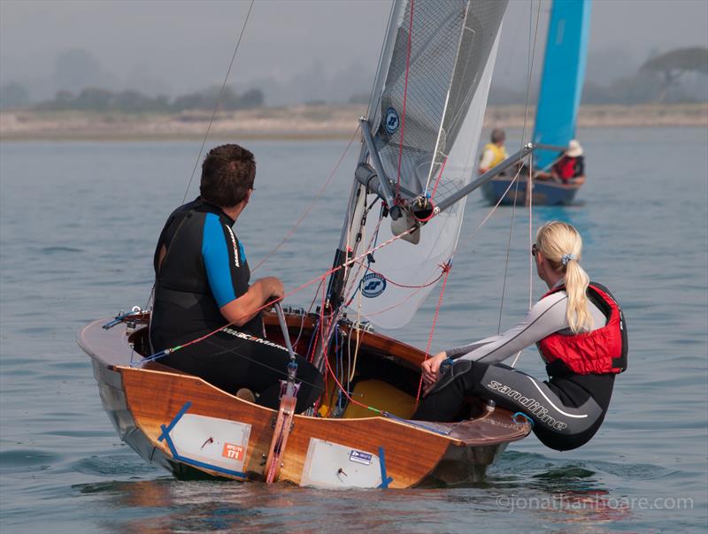 Full concentration from Simon & Brenda Hault in their 1965 built Merlin ‘Phantasy 2' during the Bosham Classic Boat Revival 2014 photo copyright Jonathan Hoare / www.jonathanhoare.com taken at Bosham Sailing Club and featuring the Merlin Rocket class