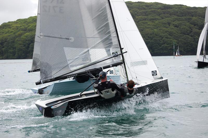 Salcombe Week for the Merlin Rockets involves a Fun exploration of the estuary, giving legs that wouldn't be found out on the more sanitized environment of a championship race course. Where else would you find a mile or more of close reaching? photo copyright David Henshall taken at Salcombe Yacht Club and featuring the Merlin Rocket class