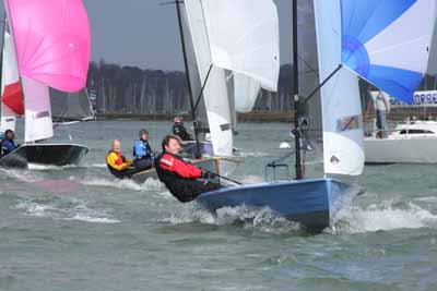 Racing during the 47th Hamble Warming Pans photo copyright Eddie Mays taken at Hamble River Sailing Club and featuring the Merlin Rocket class