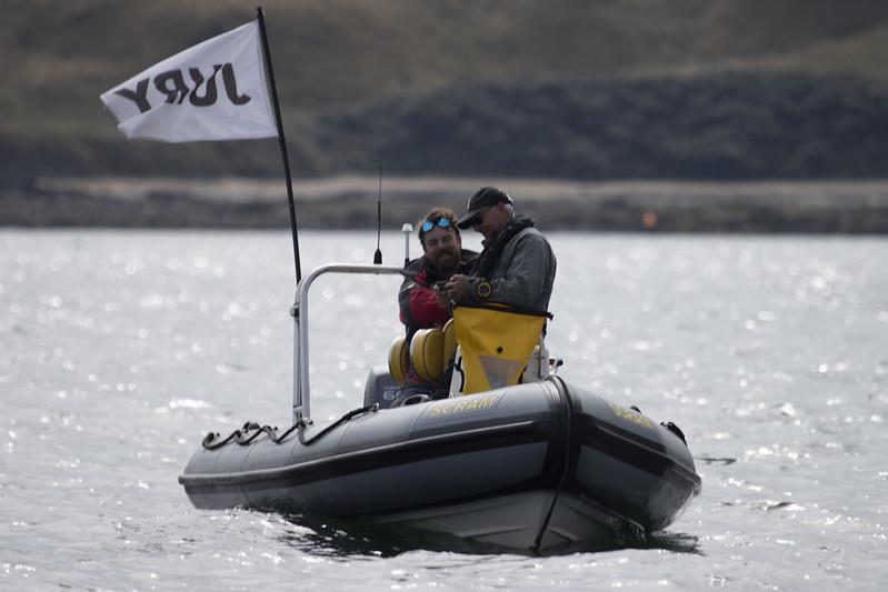 Jury boat members check their Instagram? Aspire Merlin Rocket National Championships at East Lothian day 1 photo copyright Steve Fraser taken at East Lothian Yacht Club and featuring the Merlin Rocket class