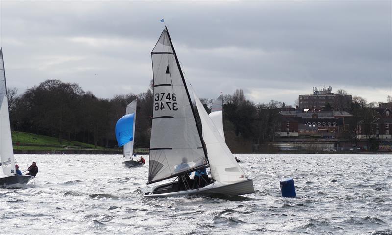 A squally mark rounding for James Wells and Anna Aylward at the Merlin open at Midland Sailing Club photo copyright Julian Harms taken at Midland Sailing Club and featuring the Merlin Rocket class