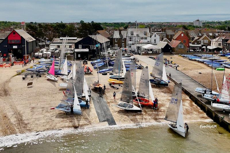 Hoisting the sails - Merlin Rocket Craftinsure Silver Tiller at Whitstable photo copyright Ayhan Betez / Eye Sky UK taken at Whitstable Yacht Club and featuring the Merlin Rocket class