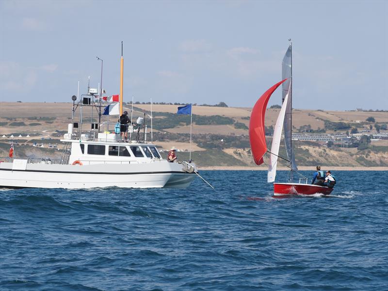 Taking the second gun. A wide angle lens would have been needed to get the 2nd place finisher in the shot on day 1 of the Aspire Merlin Rocket Nationals at the WPNSA - photo © Dougal Henshall