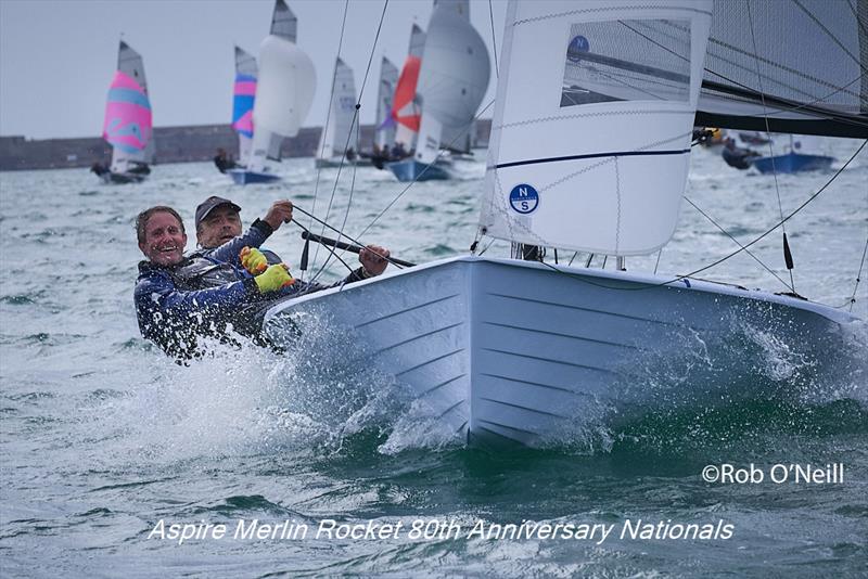 Jon Gorringe and Toby Lewis well ahead of the fleet and went on to win, no wonder they are both look so happy on day 3 of the Aspire Merlin Rocket Nationals at the WPNSA photo copyright Rob O'Neill taken at Weymouth & Portland National Sailing Academy and featuring the Merlin Rocket class