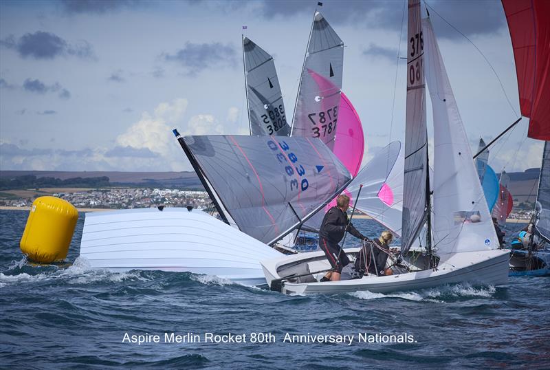 The swell at the gybe mark caught a number of competers out on day 5 of the Aspire Merlin Rocket Nationals at the WPNSA photo copyright Rob O'Neill taken at Weymouth & Portland National Sailing Academy and featuring the Merlin Rocket class