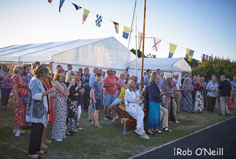 The superb evening weather and a glass or two of pop help make this a memerable evening - Merlin Rocket 80th Anniversary photo copyright Rob O'Neill taken at Upper Thames Sailing Club and featuring the Merlin Rocket class