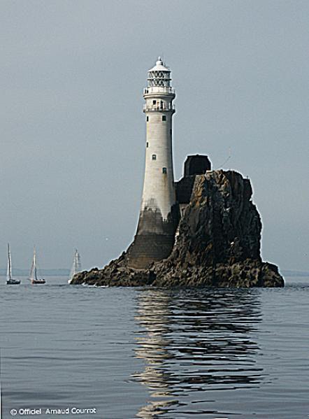 Rounding the rock slowly in the Mini Fastnet Race 2014 photo copyright Arnaud Courrot taken at Winches Club Douarnenez and featuring the Mini Transat class