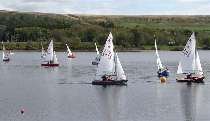 Wayne and Angela followed by Simon and Lucy and by Ashley and Michelle rounding the windward mark during race 4 of the 2024 Miracle Northern Championship  photo copyright Martin Bathe taken at Delph Sailing Club and featuring the Miracle class
