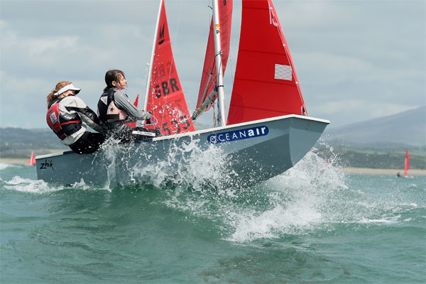 Strong winds and big waves on day one of the Mirror nationals in Pwllheli photo copyright Peter Newton taken at Pwllheli Sailing Club and featuring the Mirror class