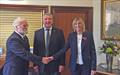 The Commodore, Brian Hinde, left, welcomes Donna Redford at the Club's AGM. Mr Stocks is moving to a new post in rugby football © Michael Ford