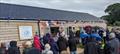 Club members celebrating the official opening of their new clubhouse © Ben Hodgson