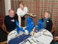 Catering manager Fiona Hirons serves Brian Collins and Jennifer Noble of Enstone at the Chipping Norton Yacht Club Inaugural Dinner held at the town’s golf club on Wednesday 30th January © CNYC