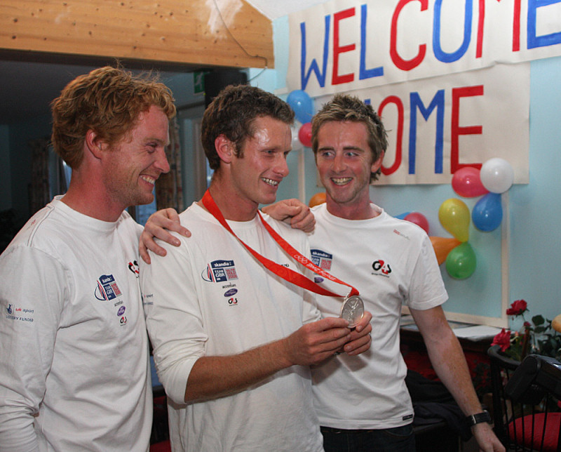 (left to right) Ben Rhodes, Joe Glanfield & Stevie Morrison are welcomed home by Exe Sailing Club photo copyright Mike Rice / www.fotoboat.com taken at Exe Sailing Club