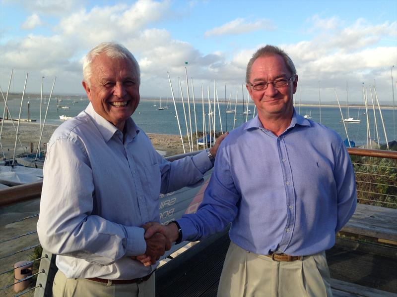 Outgoing Commodore Chris Gordon welcomes new Commodore Greg Lamb (right) photo copyright Anne Marie Wood taken at Hayling Island Sailing Club