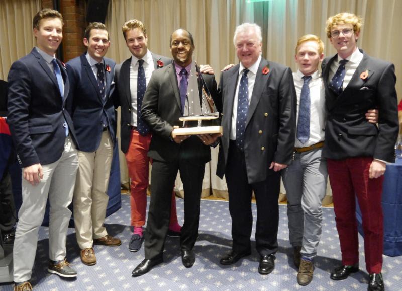 Oh, we're going to Barbados! Marc McCollin presents The Champion of Champions Trophy to Mike and Seb Blair and members of the crew of Cobra photo copyright Jennie Austen taken at Royal Southern Yacht Club