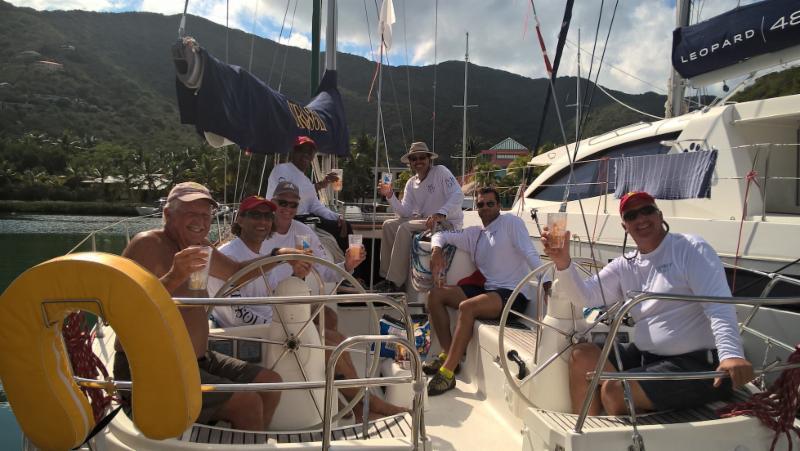 Cheers! Keith LiGreci's team on Girasoli enjoy a post-race refreshment on day 2 of the BVI Spring Regatta - photo © BVISR / www.ingridabery.com