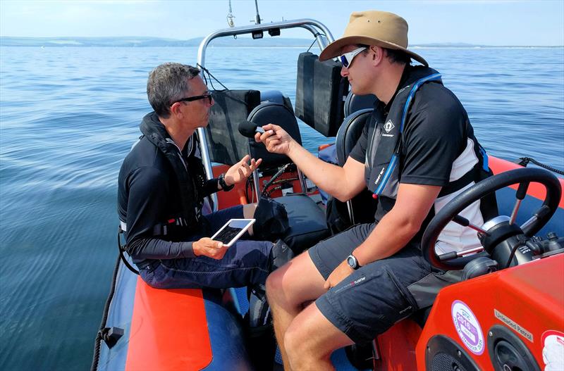 Ian Roman (left) talks to Mark Jardine photo copyright Joe Hall taken at Parkstone Yacht Club