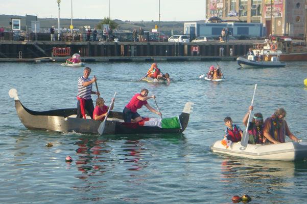 Fancy dress tender race across Weymouth Harbour during the 2018 Whyboats Weymouth Yacht Regatta - photo © Kathy Claydon