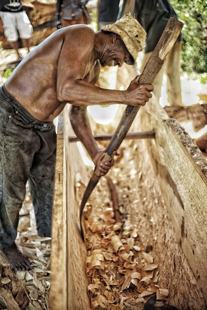 Local boat builder from Zanzibar carving one of the ngalawas for this year's Kraken Cup from a mango tree photo copyright Rahim Saggaf taken at 
