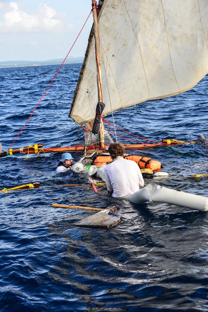 Team Gimme Dat Booty from Canada, in the last edition of the Kraken Cup, discover ngalawas can quickly take on water - photo copyright Team Pappa Chambo taken at 