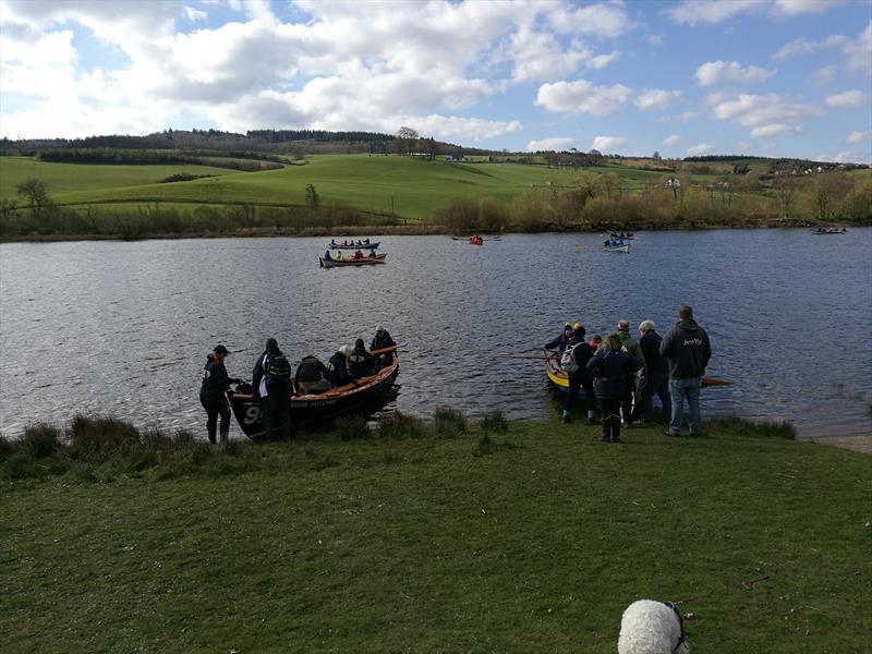 Nine St Aylsa Skiffs set off for their annual rowing event to Wormit photo copyright PSC taken at Perth Sailing Club