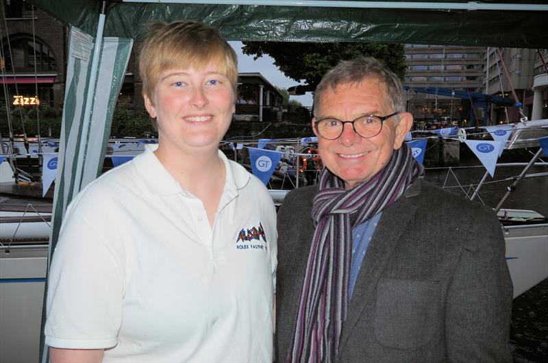 Lottie Harland with Dave Cockerill, former Topper RYA Junior National Squad coach, aboard Ausome-Lyra of London aboard St Katharine Docks Marina, London photo copyright Phil Harland taken at 