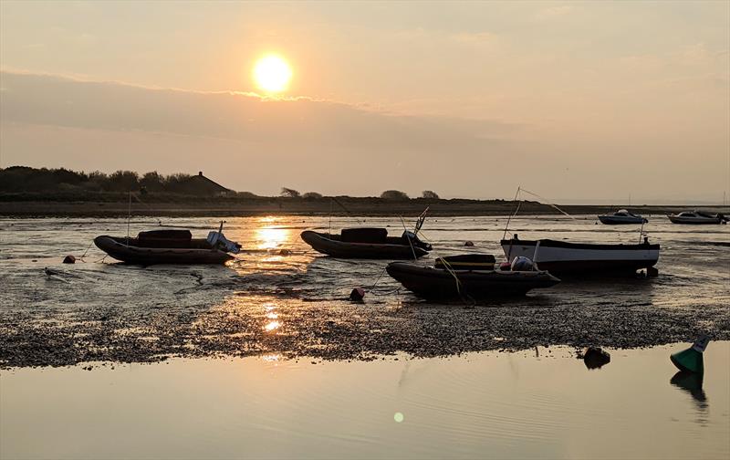 The Keyhaven YC rescue boats dry on their moorings at low tide over the Easter weekend - photo © Mark Jardine