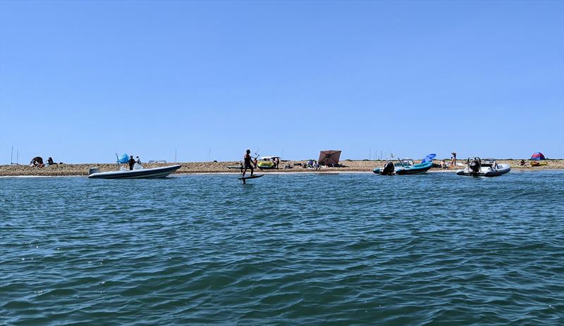 A plethora of boats enjoy the fine weather on Hurst Spit - photo © Mark Jardine