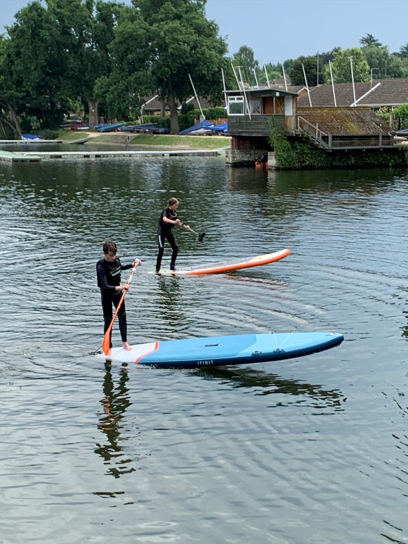 Freddie Sunderland & Stella Nygard paddleboarding at Olton Mere photo copyright Jane Sunderland taken at Olton Mere Sailing Club