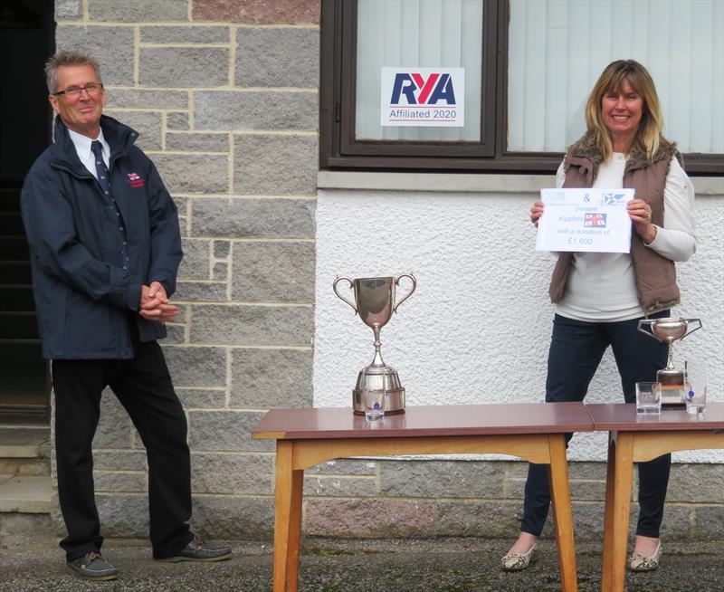 Presenting the cheque during the Catherinefield Windows RNLI Regatta in Kippford - photo © John Sproat