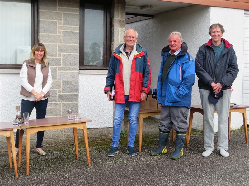 Mrs Brenda Moffat and the 'Kintra' winning crew, Stewart Monaghan (helm) with John Searle (crew / owner) and Richard Winters (crew) during the Catherinefield Windows RNLI Regatta in Kippford photo copyright John Sproat taken at Solway Yacht Club