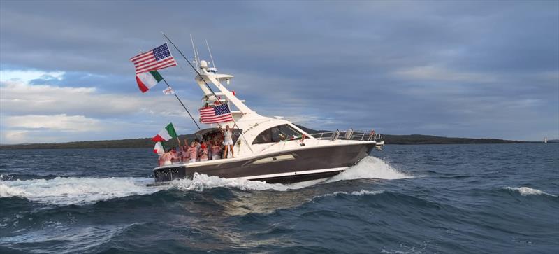 Italian and American unity after the teams work together to save American Magic's AC75 'Patriot' after a huge capsize on day 3 of the PRADA Cup - photo © Richard Gladwell / Sail-World.com