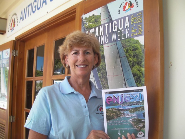 Alison Sly-Adams shows the new the free Daily Observer called Enjoy! for Antigua Sailing Week photo copyright Louay Habib / Antigua Sailing Week taken at 