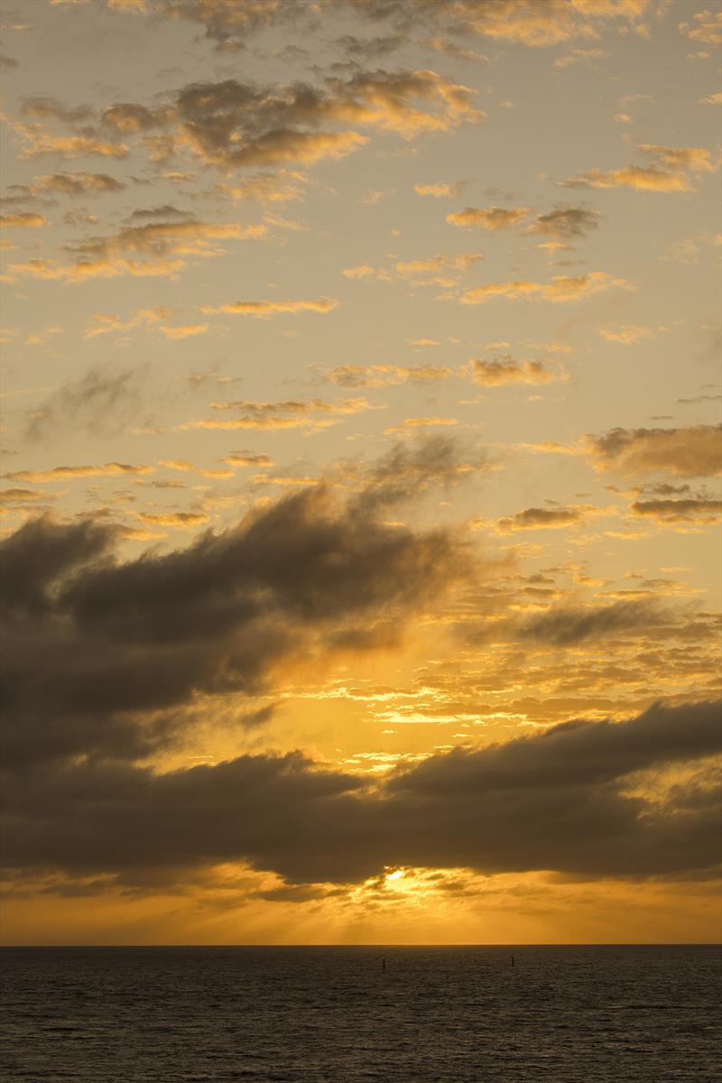 Moody sunrise at Maggie Island - SeaLink Magnetic Island Race Week photo copyright Andrea Francolini taken at Townsville Yacht Club