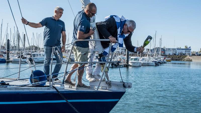 Pierre-Yves Cavant, Lionel Reigner and Lionel Péan, the 1985 Whitbread winner, christen the refitted L'Esprit d'Equipe in Les Sables d'Olonne photo copyright Team L’Esprit D’Equipe taken at 