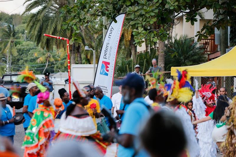 Crew members joined in a cultural procession from Nelson's Dockyard to Antigua Yacht Club ahead of the 54th Antigua Sailing Week Welcome and Peters & May Round Antigua Race Prizegiving photo copyright Paul Wyeth / www.pwpictures.com taken at Antigua Yacht Club