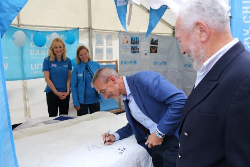 William and Robin sign Unicef Spinnaker of Support photo copyright Clipper Ventures taken at 