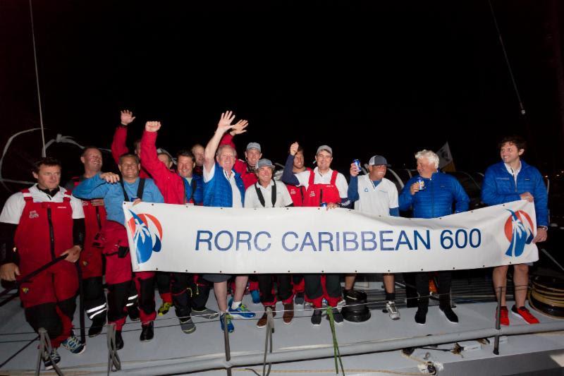 Rambler 88 celebrate on arrival in Antigua photo copyright RORC / Arthur Daniel taken at Royal Ocean Racing Club