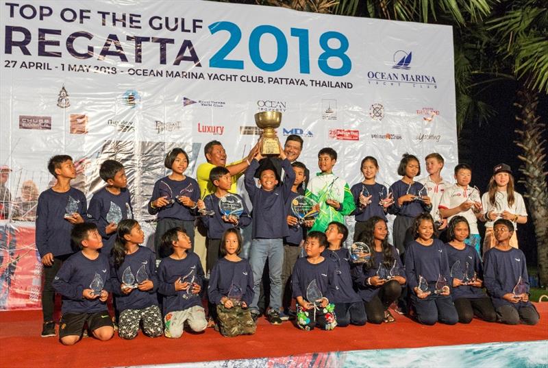 Panwa Boonak (centre, holding trophy) – 2018 Thailand Optimist National Champion photo copyright Guy Nowell taken at Ocean Marina Yacht Club