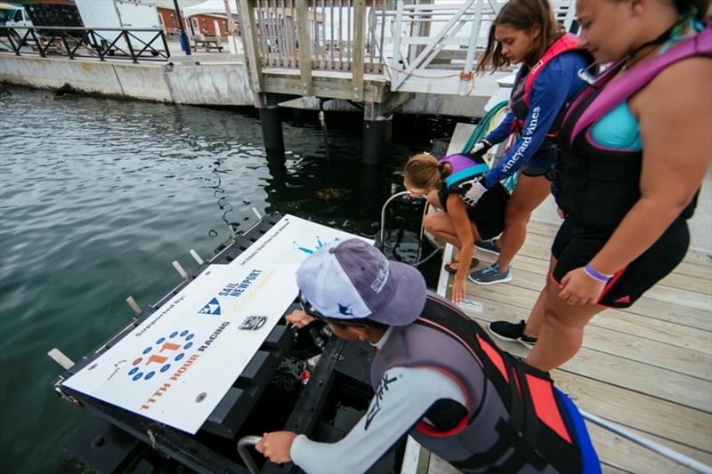 Students at Sail Newport help empty a Clean Ocean Access Trash Skimmers photo copyright Amory Ross taken at 