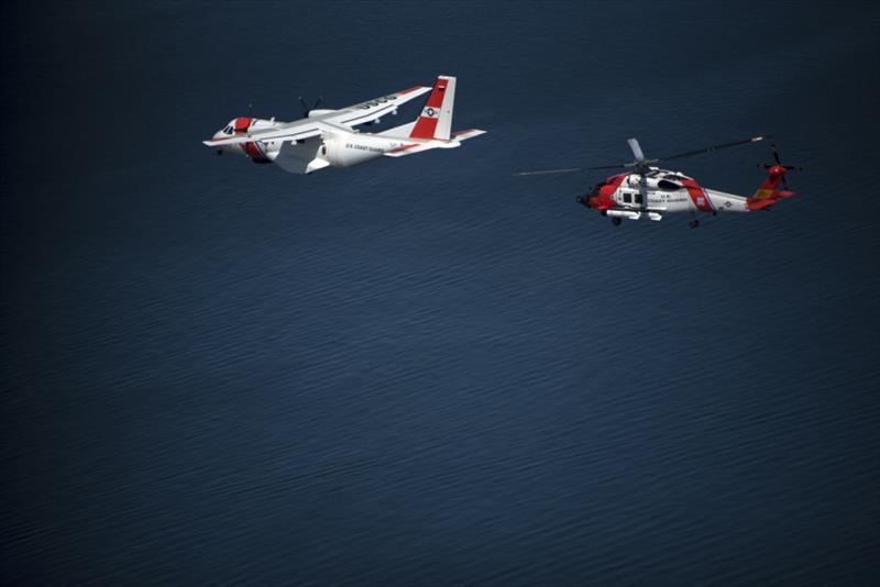 A Coast Guard Air Station Cape Cod HC-144 Ocean Sentry aircraft and an MH-60 Jayhawk helicopter fly over Newport, Rhode Island, Tuesday, May 8, 2018. The aircraft flew over Coast Guard Cutter Eagle as part of the opening of the Volvo Ocean Race village photo copyright Petty Officer 3rd Class Andrew Barresi taken at 
