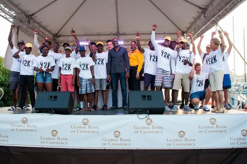 Greig City Academy crew of Valiant with representatives from sponsor, Global Bank of Commerce photo copyright Ted Martin taken at Antigua Yacht Club