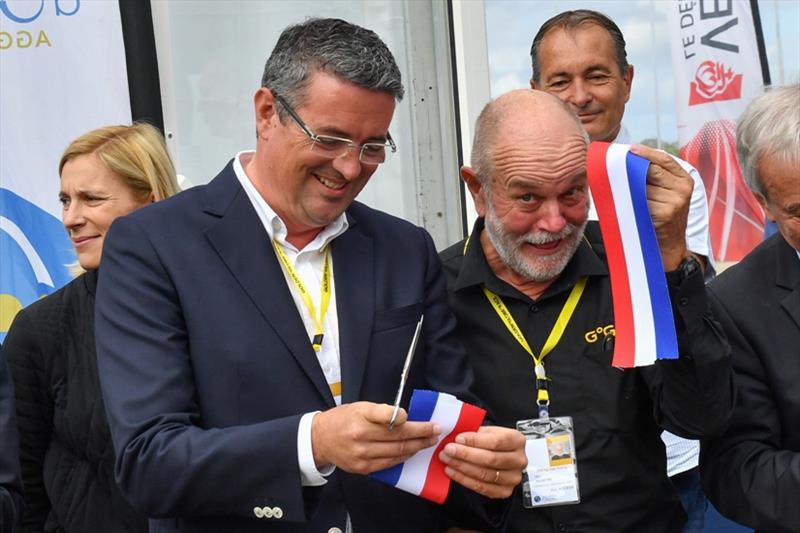 Yannick Moreau President of the Les Sables d'Olonne Agglomeration shares samples of the ribbon cut to open the GGR Race Village with Don MacIntyre, Chairman of the Golden Globe Race - photo © Christophe Favreau / PPL / GGR