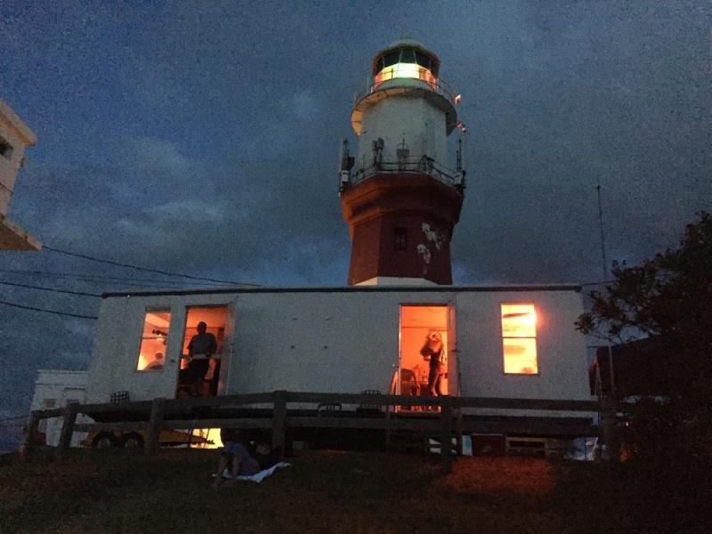 Instead of a race committee boat, the finish line team mans a trailer set directly beneath St. David's Lighthouse where they can observe the finish line offshore - photo © John Burnham