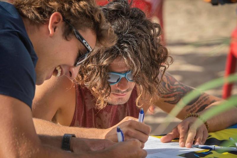 Mattia Fabrizi and Giovanni Passani signing up - photo © Gwen Marche