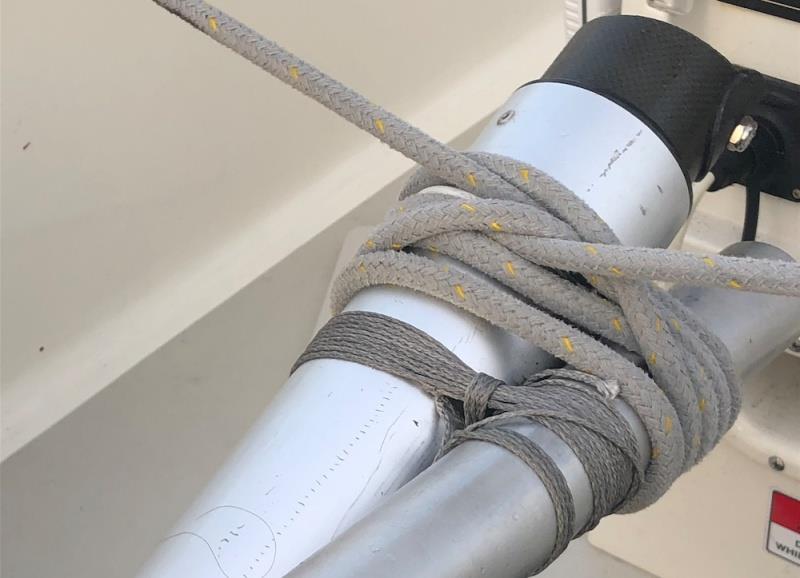 Close-up view of the Dyneema lashing and control lines at inboard end of tiller - photo © Bailiwick / Chris Museler