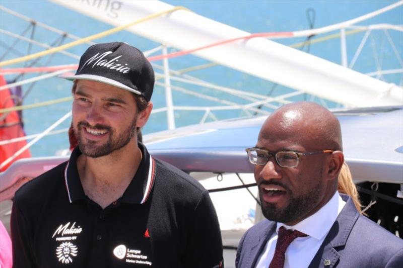 Skipper Boris Herrmann (left) with Bermuda Tourism Authority's Glenn Jones (right) aboard Malizia. - photo © Louay Habib