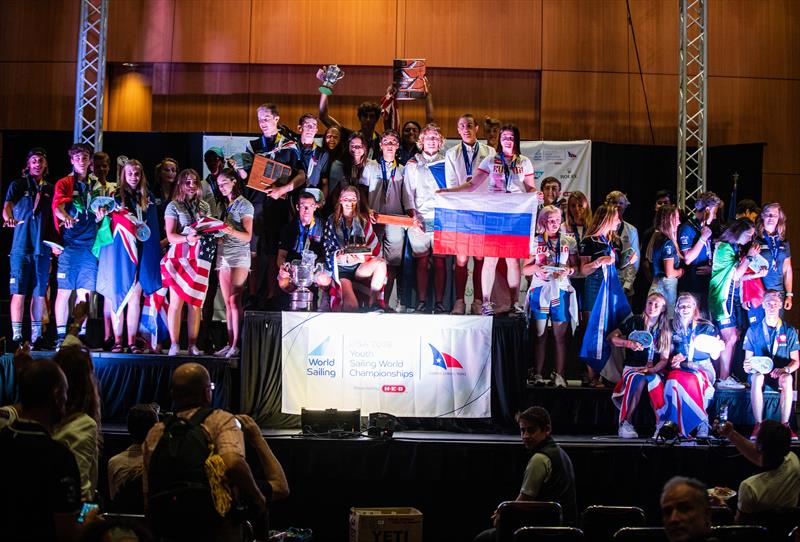 Medalists from the nine classes on stage at the 2018 Youth Sailing World Championships, Corpus Chris, Texas photo copyright Jen Edney / World Sailing taken at 